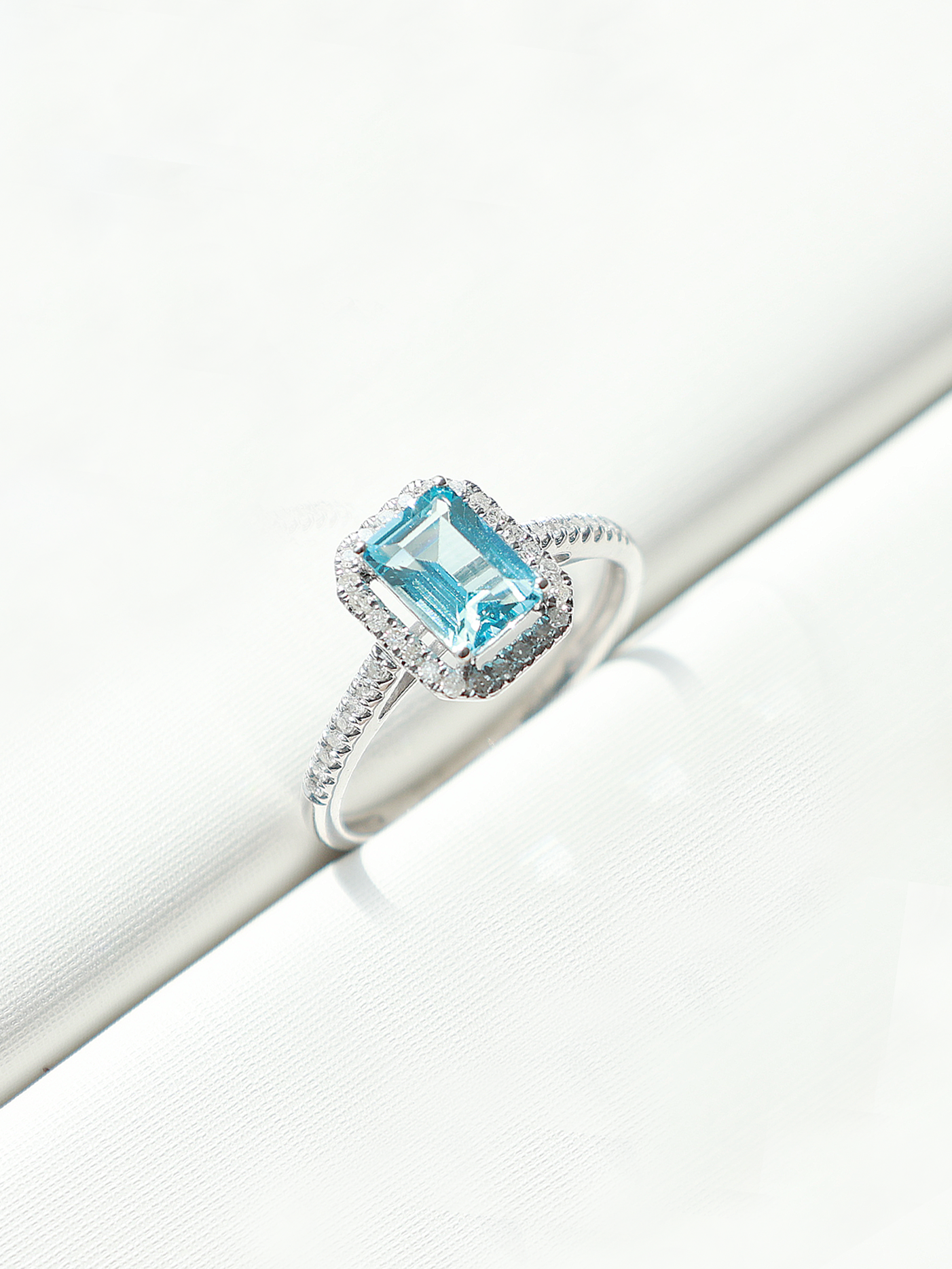 BLUE TOPAZ & DIAMOND RING